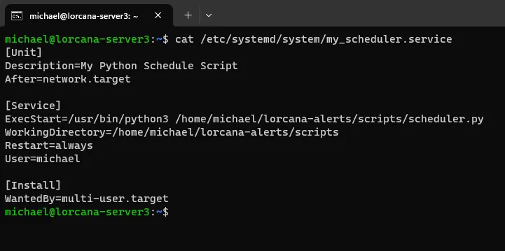 Terminal showing a systemd unit file that runs the Python scheduler script on boot and restarts it always